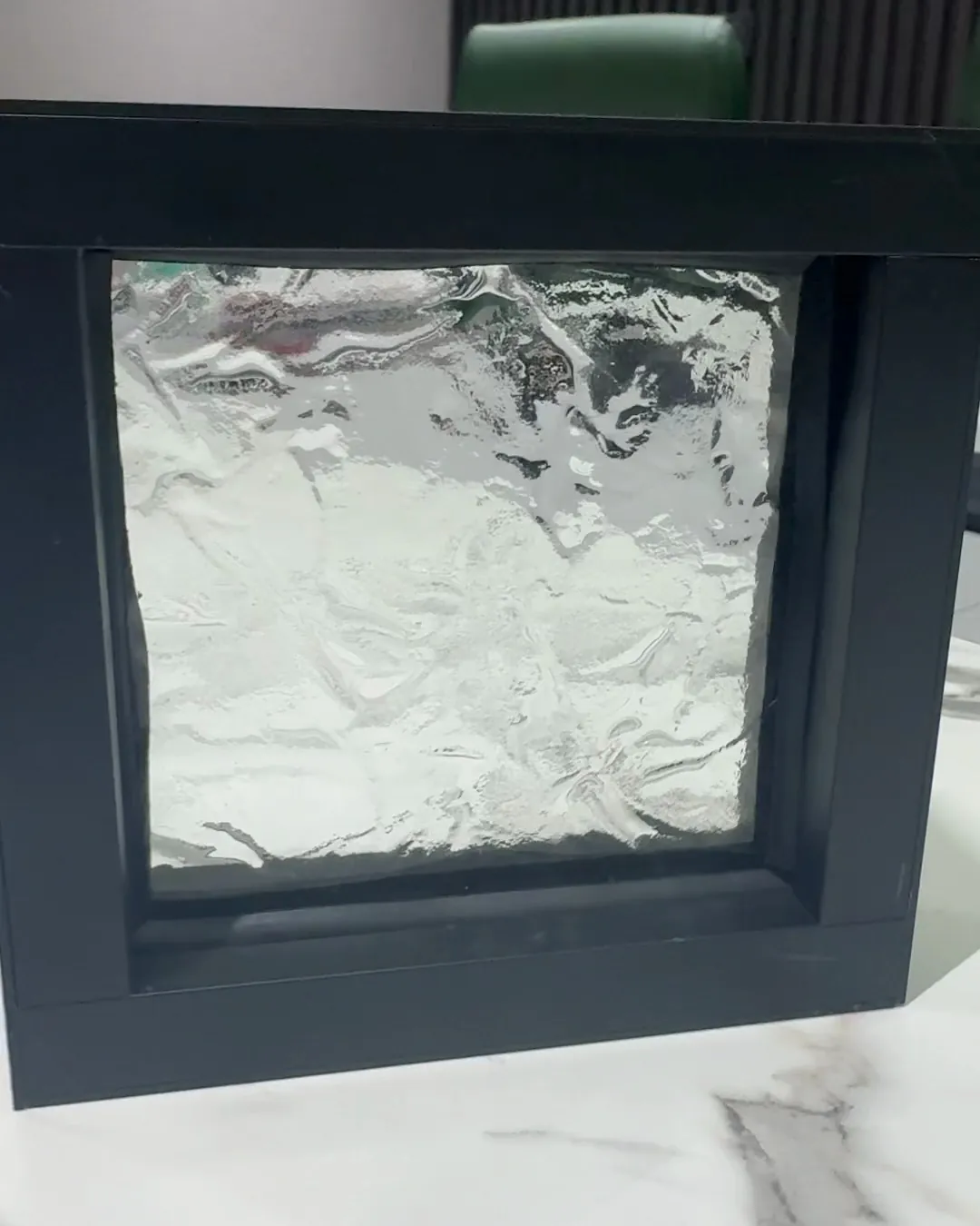 Clear cast, black frame, cast glass by ARG