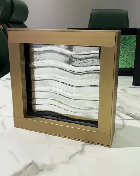 Wave cast, brass frame, cast glass by arg
